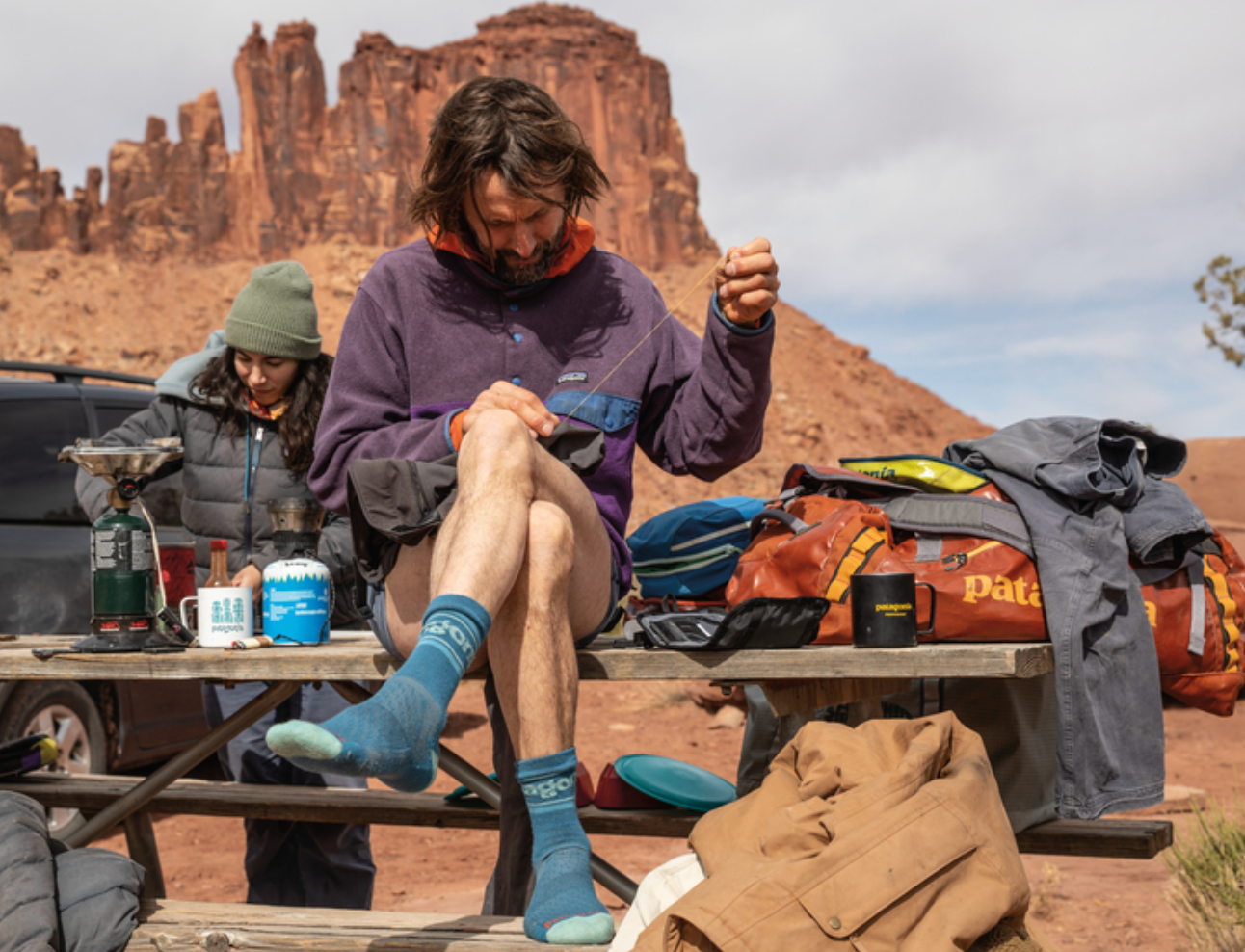Persona usando ropa Patagonia en actividades outdoor disponible en Qivitoq Olot