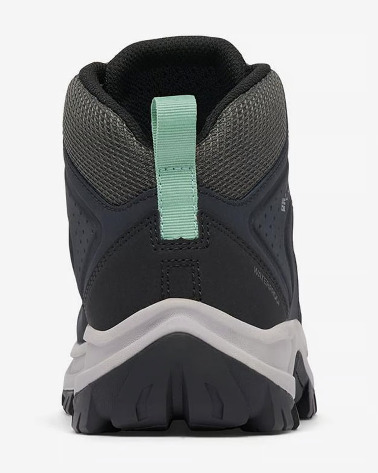 Detalle del talón de la zapatilla Columbia W’s Transverse Hike Waterproof en color Black Sage para rutas de montaña.