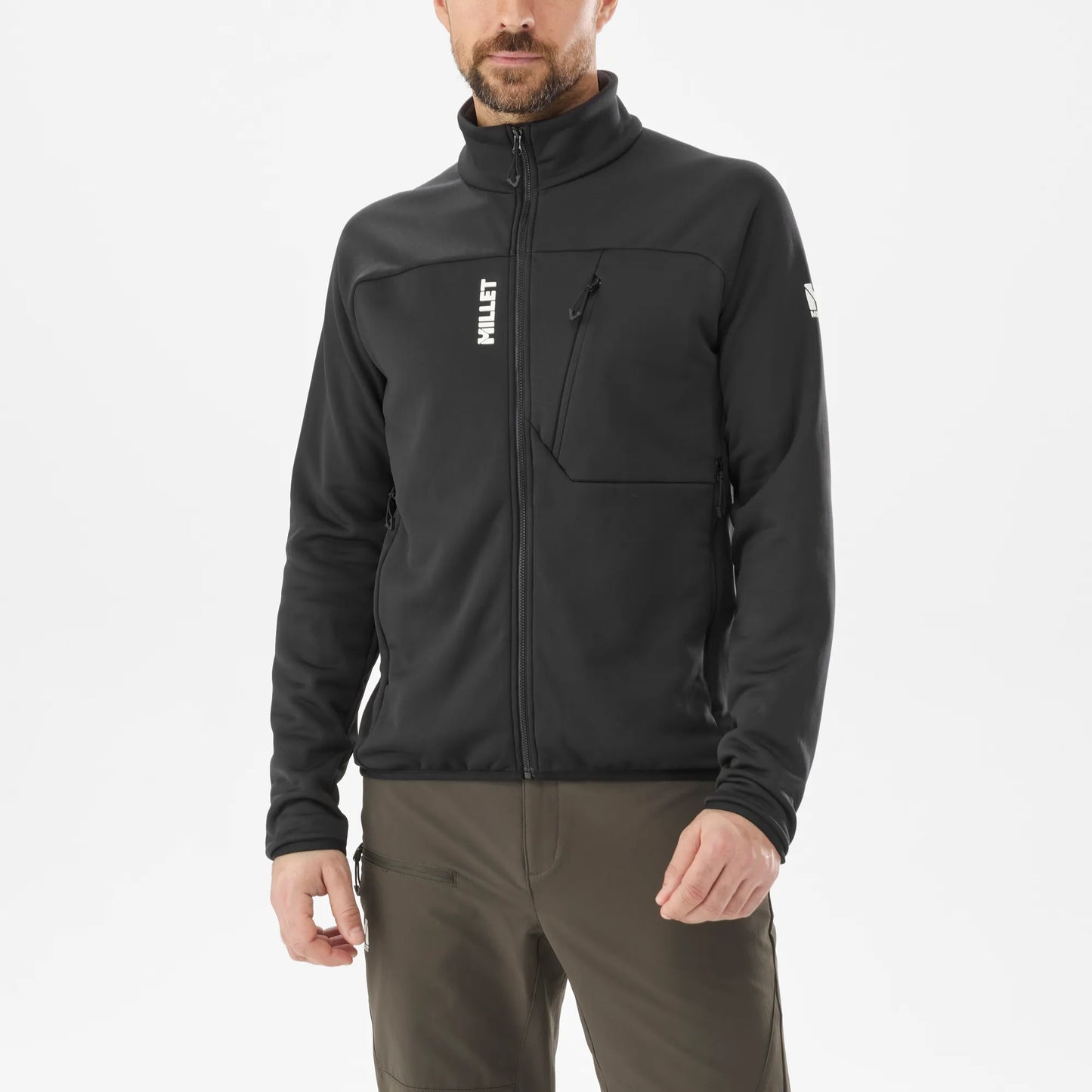hombre usando forro polar Millet Seneca Fleece Jacket color Noir visto de perfil