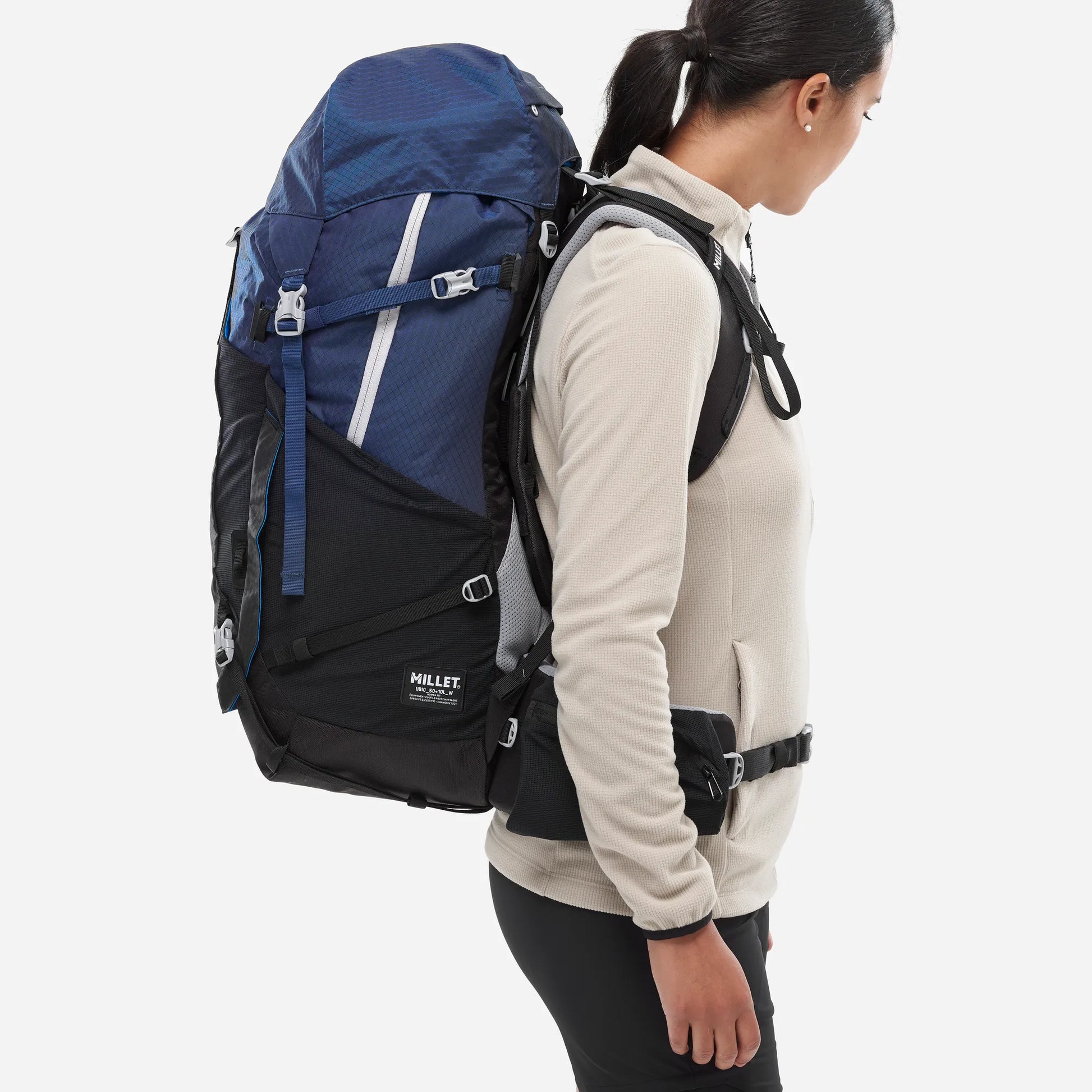 mochila Millet Ubic 50+10 mujer vista de perfil